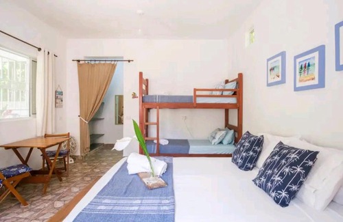 Praia da Fortaleza House | Loft Praia Brava - Suíte com Área Gourmet Privativa