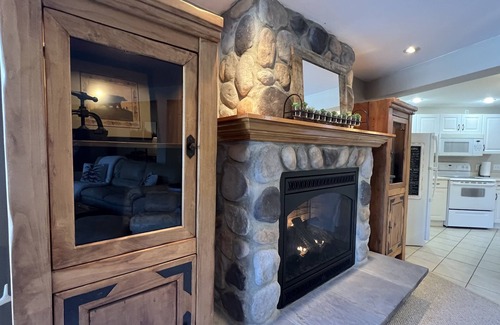 St. Joseph Apartment | LOG BEAR DEN near SJU, CSB & Wobegon Trail. Relaxing. Romantic. Refined. Rustic.