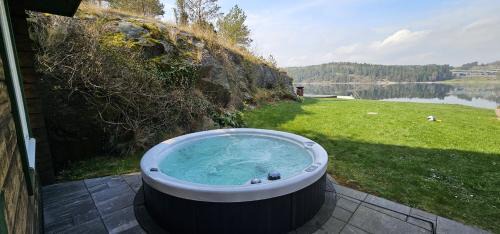 Torreby House | Log cabin with pool, sauna and boat by Torreby Castle