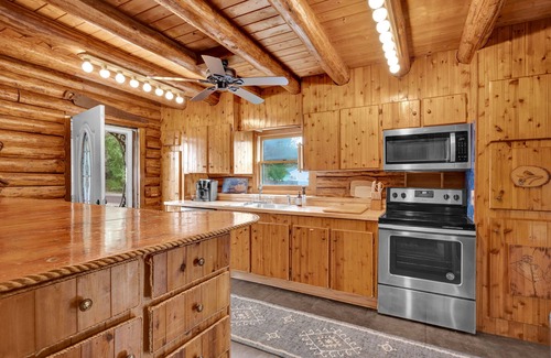 Mayhew Cabin | “Logged Out”- Log Cabin Rental