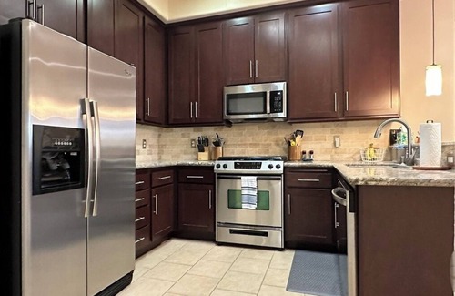Callender House | Long Term Rental in Trilogy - by a monarch butterfly grove in a golf community