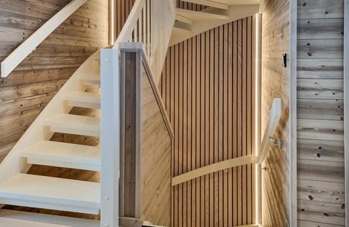 Tjaldal House | Look forward to family time together in this spacious semi-detached house with whirlpool.