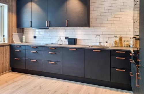 Tjaldal House | Look forward to family time together in this spacious semi-detached house with whirlpool.