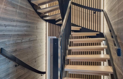 Tjaldal House | Look forward to family time together in this spacious semi-detached house with whirlpool.