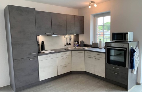 Loppersum House | Loppi Hus - High-quality vacation home in direct canal location