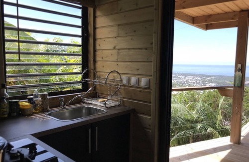 L'Etang-Sale House | Lounge of the high panoramic view between Ocean and Mountains