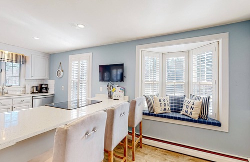 Cotuit House | Lovell's Pond Retreat - remodeled home with sunroom, steps to secluded pond