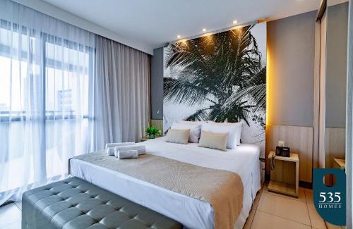 Caminho das Arvores Apartment | Lovely Suite Compact Kitchen in Central Region