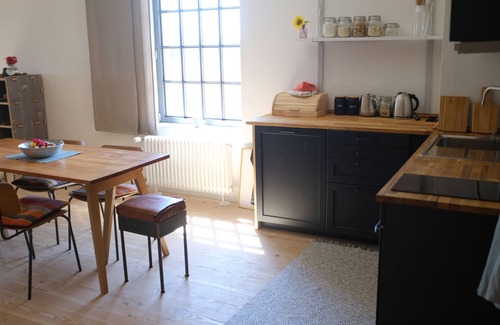 Haarstorf Apartment | Lovingly converted workshop in former stable building