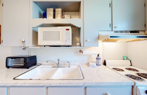 Lake Junaluska Apartment | Lower level condo with private patio, washer/dryer, pool, and mountain views