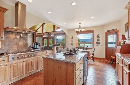 Sandpoint House | Luxurious Lakefront Home with Private Hot Tub, Dock, Beach Deck, Fire Ring