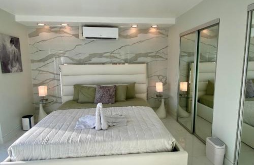 North Bay Village Apartment | Luxurious remodeled direct Waterfront apartment with Miami skyline view and outdoor terrace Free parking 5min drive to Miami Beach