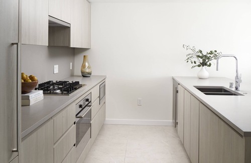 South Lake Union Hotel | Luxury 2-BR Suite in South Lake Union: Pools, Gym, Kitchen, & Balcony