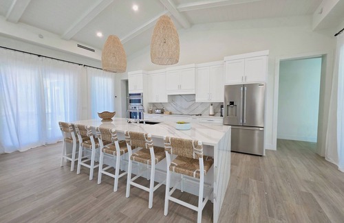 Treasure Cay House | Luxury 4 bedroom home on Ocean Blvd w/private access to the beach. Sleeps 14