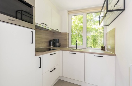 Ouddorp House | Luxury bungalow suitable for 4 persons. 1 km away from the beach/center.