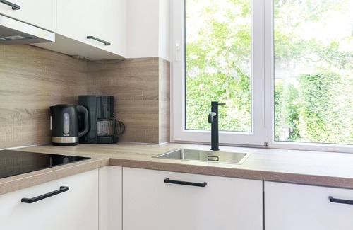 Ouddorp House | Luxury bungalow suitable for 4 persons. 1 km away from the beach/center.