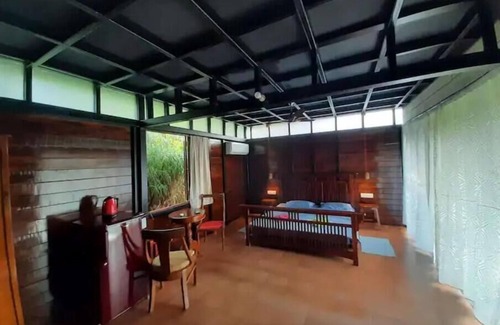 Morjim House | Luxury cottages in lush green panoramic windows