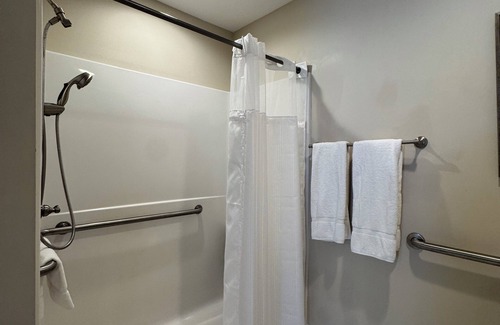 Elizabethtown Resort | Luxury Lodging, Lakefront View, King Bed w/Private Bath, Handicap Shower, Private Patio.
