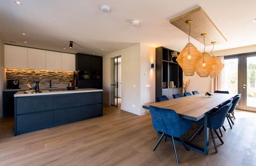 Nes Villa | Luxury villa Sig Ward with pool, sauna, spacious living room and beach 1 km away