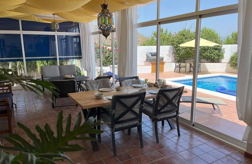 Vinuela House | Luxury villa with great views - private pool - large winter garden