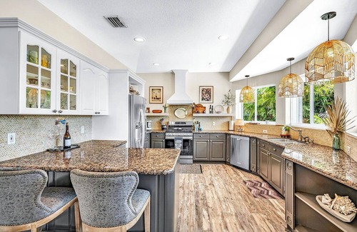 Twin Lakes House | Luxury Water Front Home, Private Pool, Spa, Tiki Bar, 36' Foot Dock with Kayaks