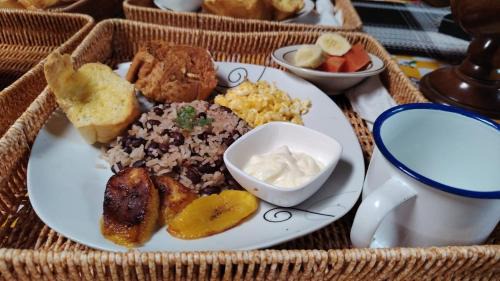 Canton Dota Ski Chalet | Magic Cabin in Jardín de Dota A real Costa Rican Farm experience with Breakfast included Trout fishing in the lagoon Fruit tasting & beautiful garden with farm animals