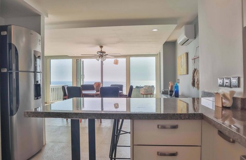 Brisas del Marques Condo | Magical sunsets, king bed, and pro service B403