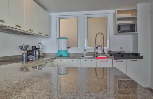 Brisas del Marques Condo | Magical sunsets, king bed, and pro service B403