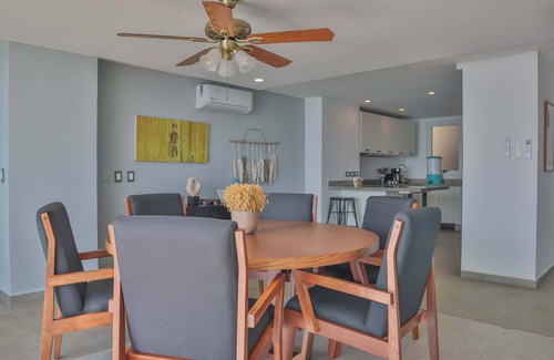 Brisas del Marques Condo | Magical sunsets, king bed, and pro service B403