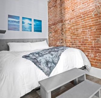 St. Charles Apartment | Main Street Balcony Apartment For up to 8 guests!