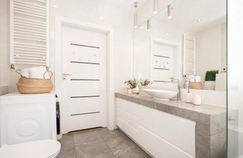 Baluty Apartment | Manufaktura Residence - Apartament z Parkingiem i Dwoma Łazienkami