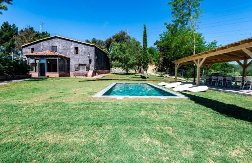 Hostalric Villa | MAS PUIG PIQUÉ - piscina privada, porche, BBQ, y WIFI - 15 PERSONAS