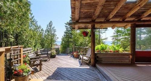 Lion's Head House | Massive Rustic Waterfront Log Cabin