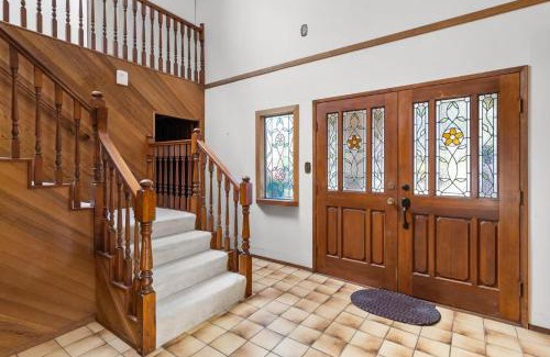 Ladner House | Master bedroom with spacious bathroom