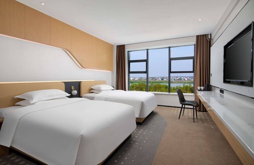 Miluo Hotel | Microtel by Wyndham Miluo Downtown Hotel