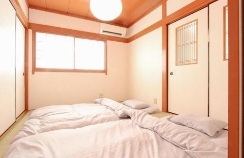 Konohana Apartment | Minima Stay 静かな貸切戸建て 最大10名 軽自動車用駐車場