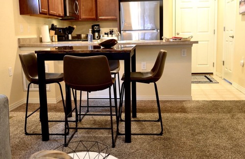 Centerra House | Modern 2 Bedroom Townhome, 1.5 Bathrooms, 1 Car Garage with Level 2 EV Charging