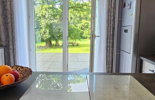 Midlum Apartment | Modern and cozy vacation apartment on the North Sea, rural, quiet, with garden