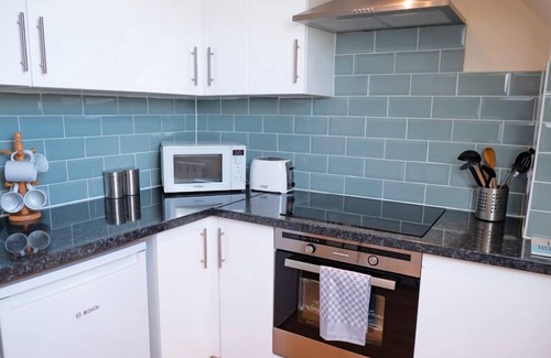 St Sampsons Apartment | Modern apartment in picturesque north Guernsey, by beautiful bay and Vale Castle