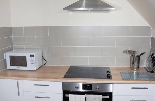 St Sampsons Apartment | Modern apartment in picturesque north Guernsey, by beautiful bay and Vale Castle