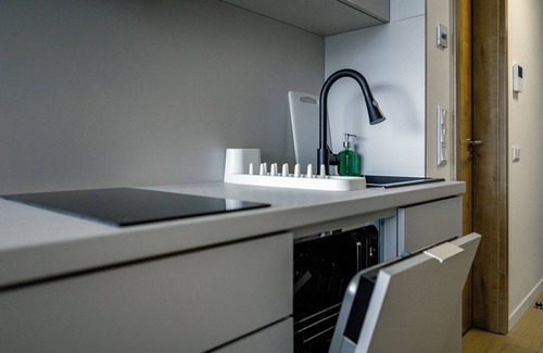 Nivy Apartment | Modern Apartment in Downtown w/Garage, Balcony & WiFi