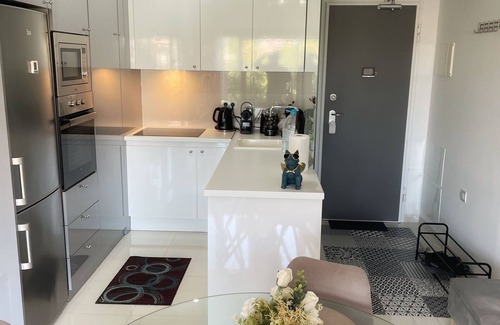 Pueblo Latino Condo | Modern Beach Home + Roof Terrace