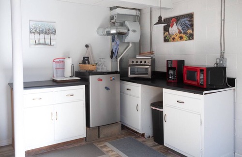 Clifford Apartment | Modern , farmhouse basement, suite, queen bed, efficiency , dogs welcome.