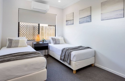 Trinity Beach House | Modern Home with Private Spa and Fenced Garden