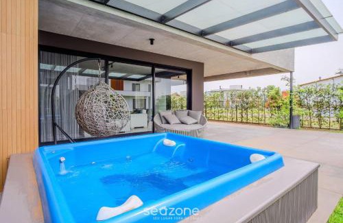 Praia do Rosa House | Modern house with pool next to Surfland ROI00
