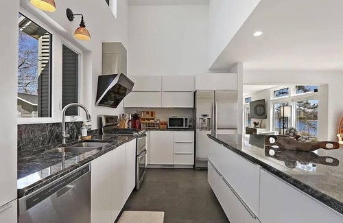 Waterford House | Modern lake house with a double lot. The views are amazing inside and out!n