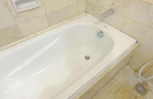 Braga Apartment | Modern Look 3BR at Apartment Braga City Walk By Travelio