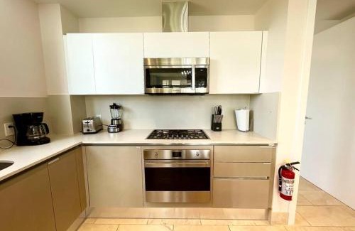 Playa Blanca Apartment | Modern - Marina View Balcony - Exquisite Pool - Sleeps 6