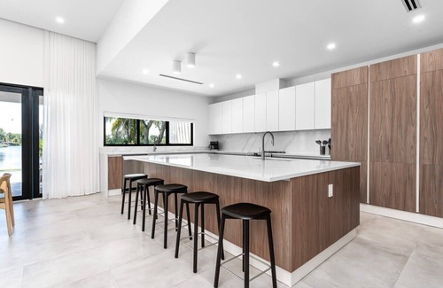 Ojus House | Modern Waterfront Paradise with Heated Pool - Near the Beach & Aventura Mall!