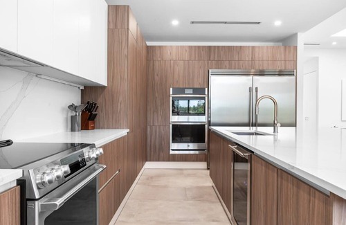 Ojus House | Modern Waterfront Paradise with Heated Pool - Near the Beach & Aventura Mall!